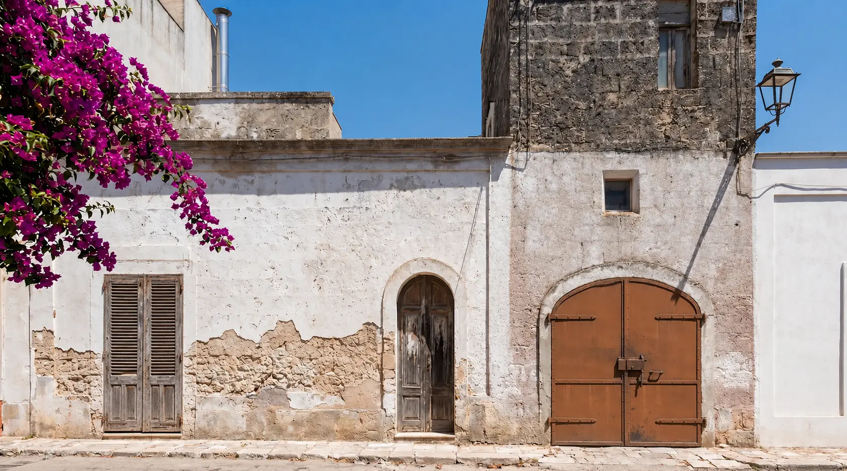 The beautiful historic exterior stone facade of Corte D'Azeglio in Salento - Before.