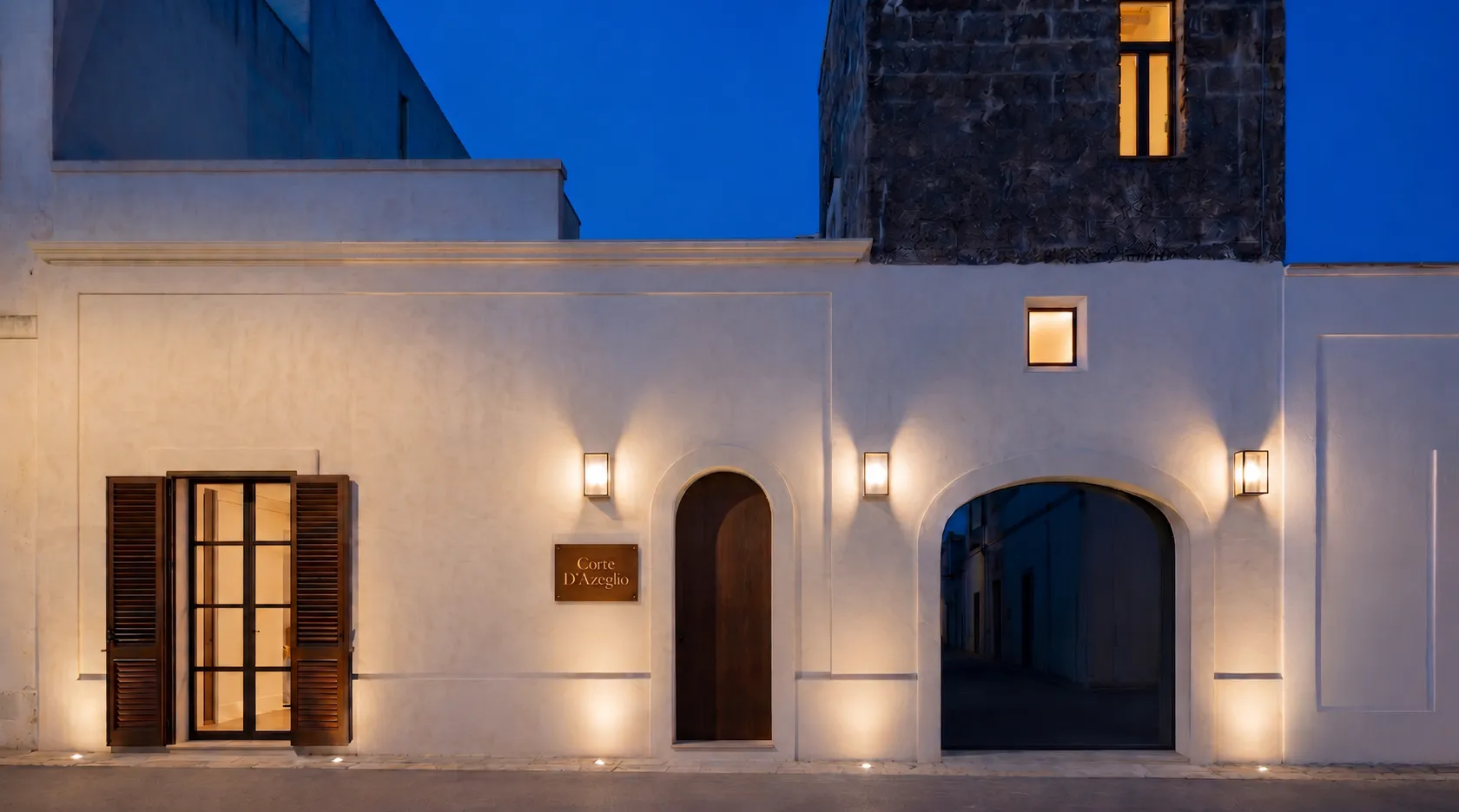 Restored courtyard of a luxury private residence in Salento, Minimalist quiet luxury interior design at Corte D'Azeglio