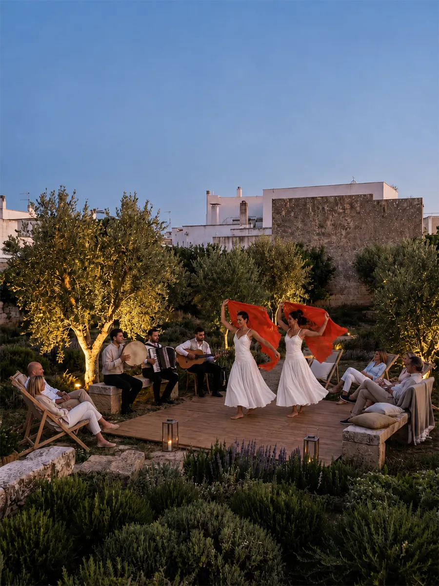 Intimate evening of traditional Pizzica music and dancing in the olive grove.